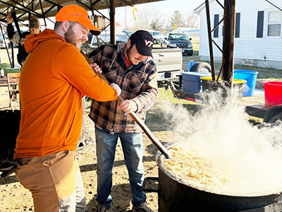 Two employees organizing a Souper Bowl