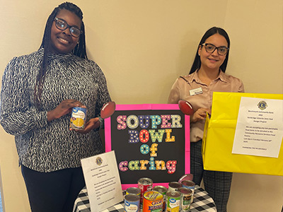 Two employees organizing a Souper Bowl