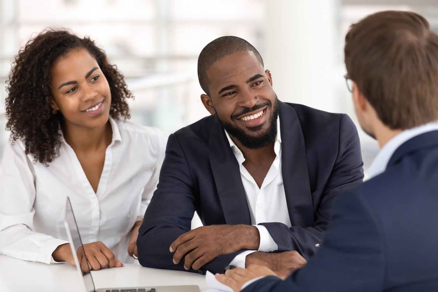 couple talking with banker