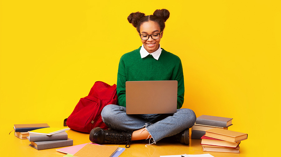 college student using laptop