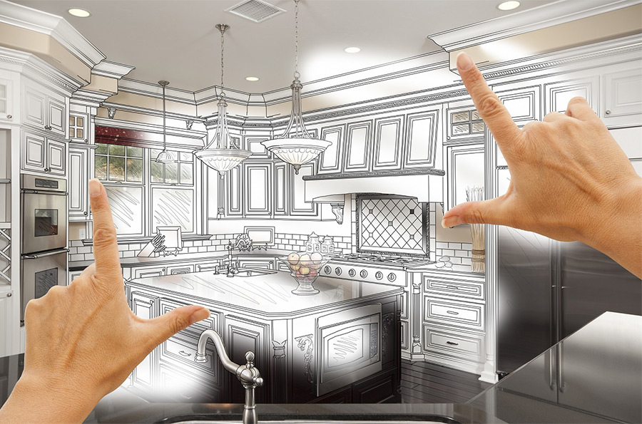 Hands viewing kitchen design