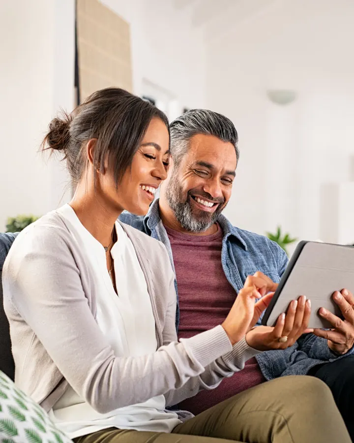 Couple looking at tablet
