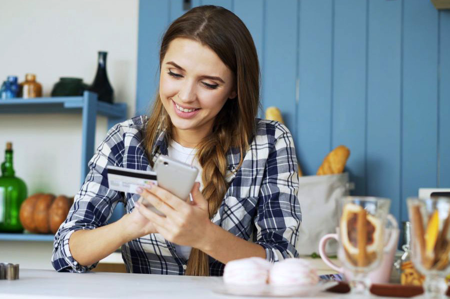 woman adding her debit card to Card Suite Lite app