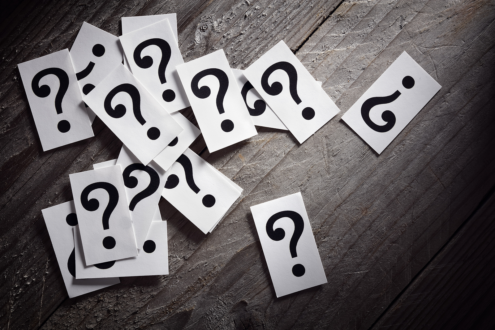 scattered question marks