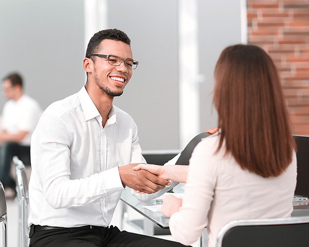 banker meeting with a business owner to discuss account options